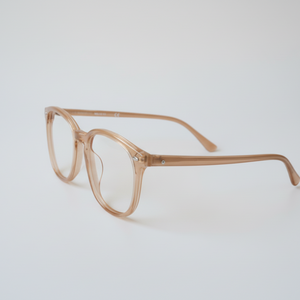 Beige glasses with light gray background